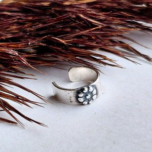 Dainty sterling silver flower helix cuff with a handcrafted fine silver daisy detail