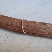Thin band recycled sterling silver minimalist stacker ring, hand forged by The Tiny Tree Frog Jewellery