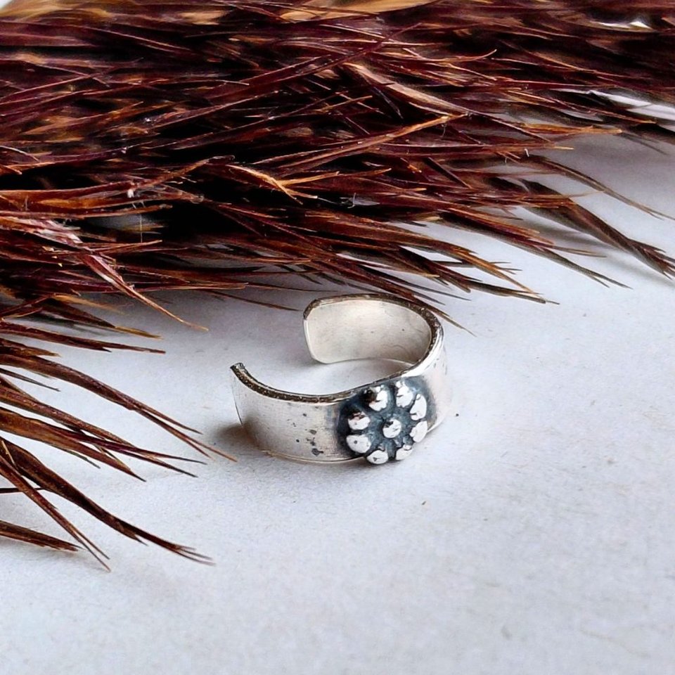 Dainty sterling silver flower helix cuff with a handcrafted fine silver daisy detail