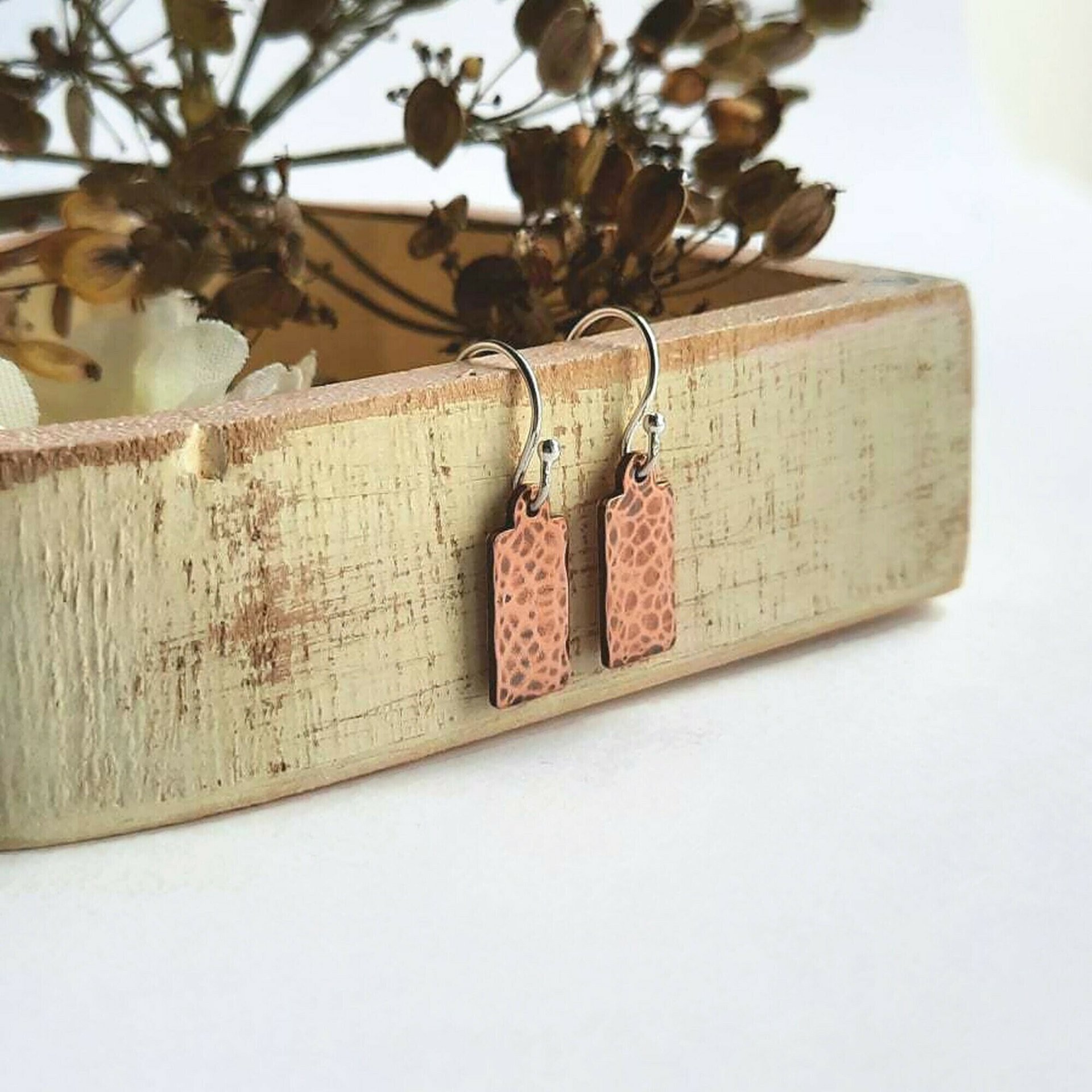 Hammered and textured copper drop earrings, handmade by The Tiny Tree Frog Jewellery
