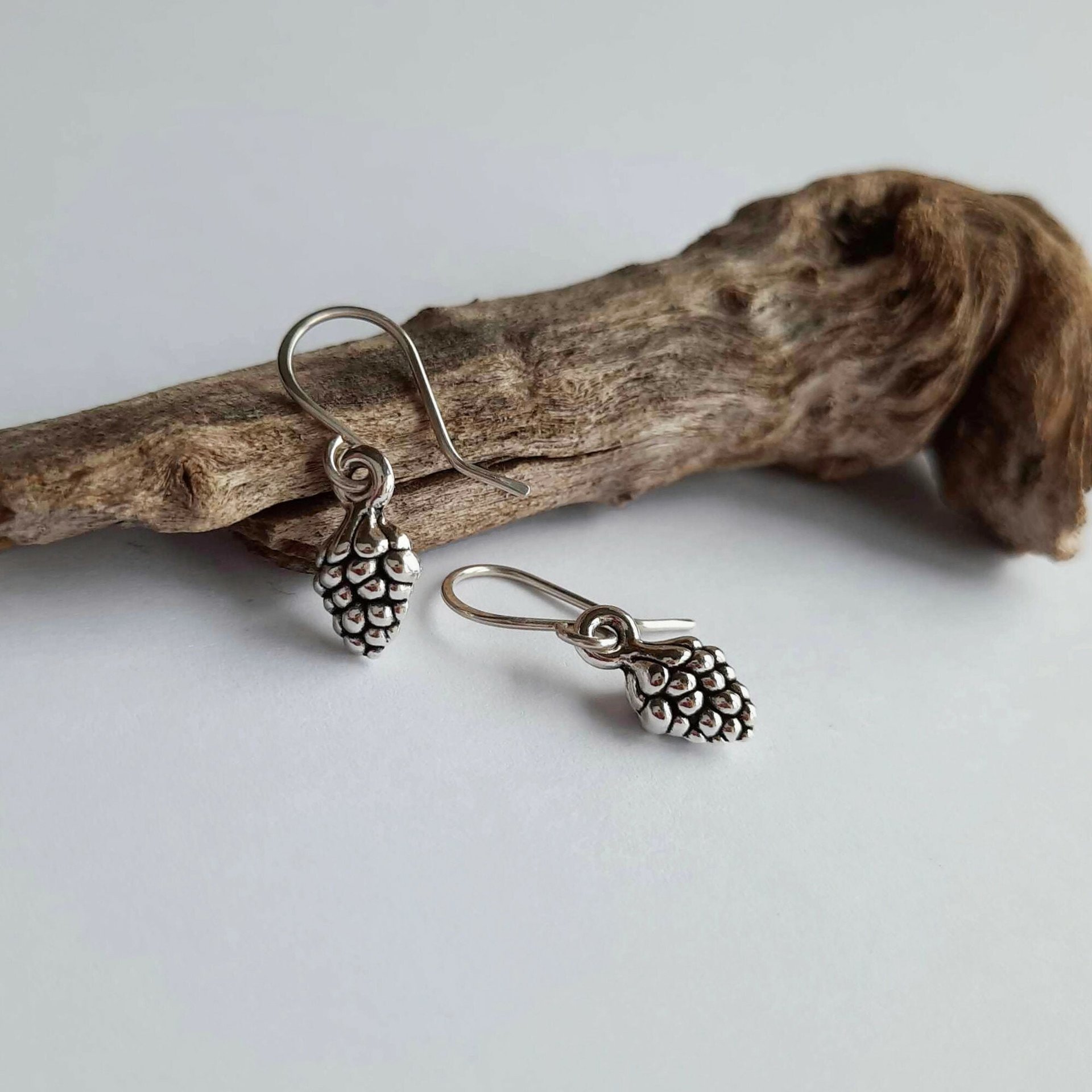 Silver pine cone drop earrings on handmade recycled 925 sterling silver ear wires by The Tiny Tree Frog Jewellery